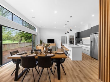 Sleek modern home with expansive park views