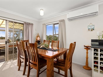 Panoramic Coastal Living with Income Potential in