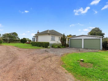 Land, 2 houses, sheds, subdivision options