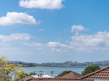 Modern elegance meets panoramic water views