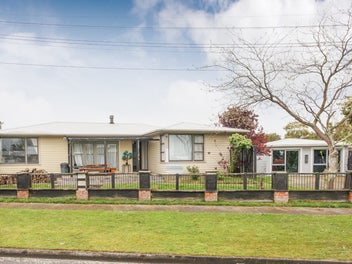 Multi-generational Family Home With Potential!