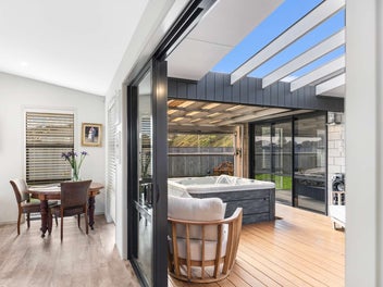 Designer Seaside Living with Impressive Garaging!