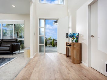 Elegant Brick & Weatherboard Family Haven in Orewa