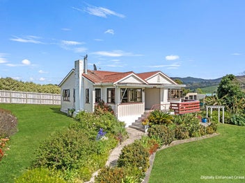 A Dream Home with Sea Views & Sheds!