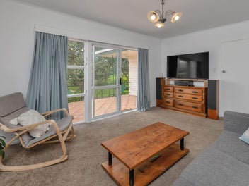 Act Fast ! Solid 1960s Home + Parking Galore !