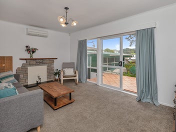 Act Fast ! Solid 1960s Home + Parking Galore !