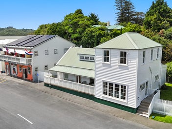 Own Rawene's historic waterfront Wharf House