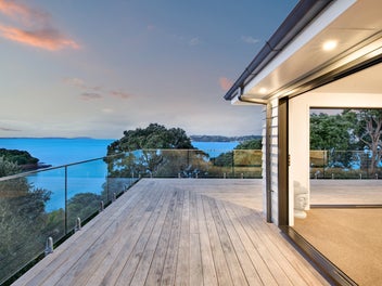Whispering Pohutukawa: A private coastal retreat!