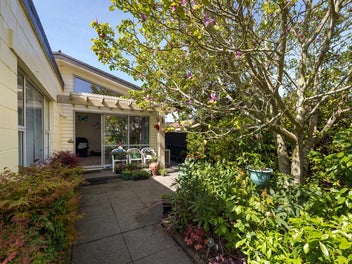 Spacious Family Living in Serene Garden Setting