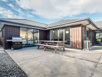 Modern holiday haven just steps from the village
