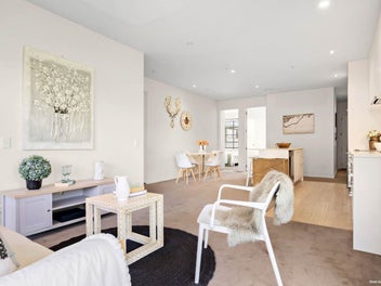 Sun-Filled CBD Penthouse with Parking