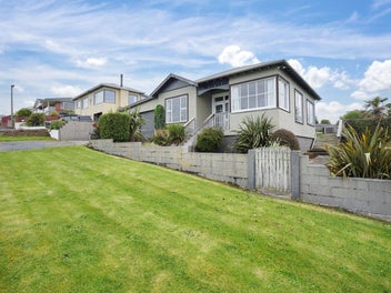 Deck days with harbour, ocean and mountain views