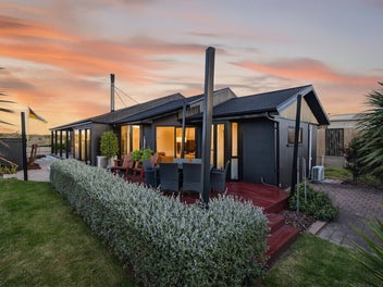 Renovated Beachfront Gem in Prime Location