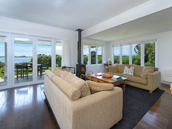 Contemporary Coastal Retreat with Inlet Views