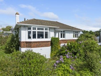 Solid, Sunny Home with Harbour Views