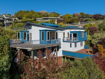 Architectural, Spacious, Big On Views & Garaging