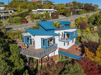 Architectural, Spacious, Big On Views & Garaging