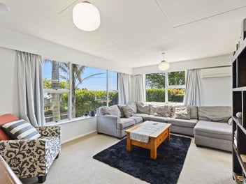 ELEVATED LARGE TWO LEVEL FAMILY HOME