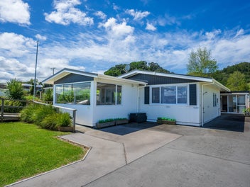 Beachfront Escape with Income Potential