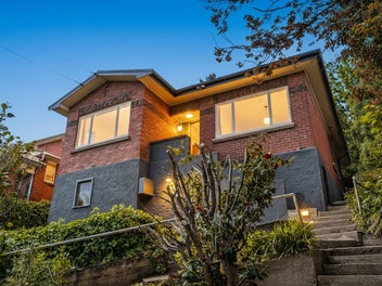 Brick Charmer with a New Roof & Elevated Views