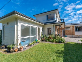 Family Charmer With Home & Income Potential