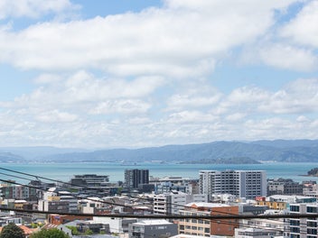 Home & Income with Views & Potential