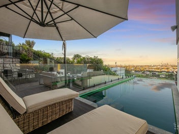 Architectural Masterpiece with Pool and City Views