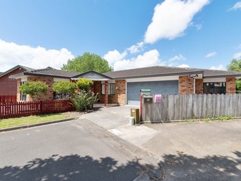 Spacious solid brick & brick tile family home