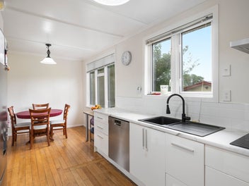 Here the kowhai blooms & the kids build treehouses