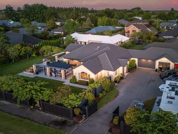 Prestigious Lifestyle with Premium Garaging!