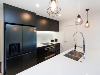 Triple garage, media room and so much more