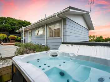 Outlook Out Front. Private Decks + Spa Out Back.