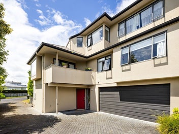 Two Townhouses, One Title