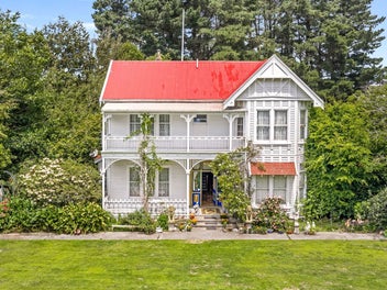 Majestic Homestead Wrapped in 5+ Acres