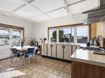 Home & Income Opportunity - Prime Location!