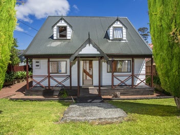 Home & Income with dual potential!