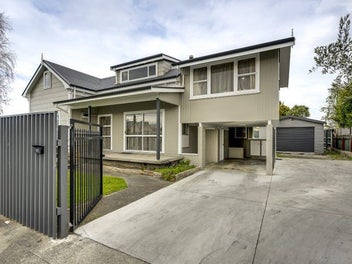 Fully Fenced with single garage and carport
