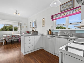 A Clear Winner with Racecourse and Peak Views