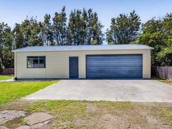 Restoration project with garaging!