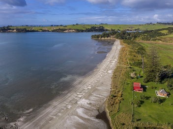 Superior beachfront at Weiti Bay