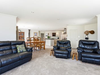 MODERN HOME with MORE THAN MEETS THE EYE!!