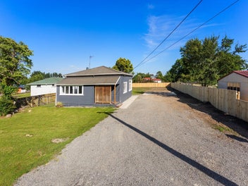 Refreshed Cottage Charm with Subdivision Potential