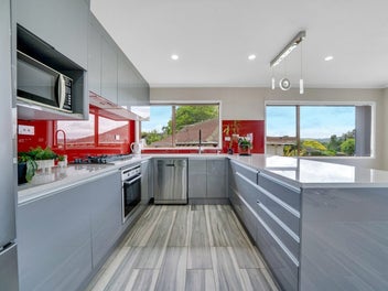 House with Home and Income Potential!