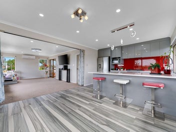 House with Home and Income Potential!