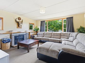 Near Half Acre with Home, Outbuildings and Paddock