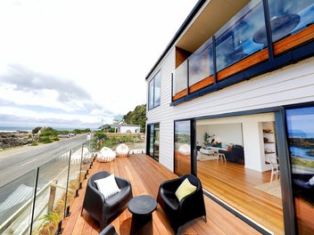 Architectural 4-Bedroom Coastal Home with Study