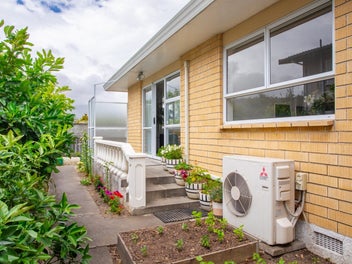 Sunny, Low-Maintenance Brick Home Near the Beach!