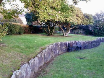 ONE LEVEL, FIVE BEDROOM BRICK HOUSE!