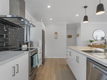 Near-New. Low Maintenance. Lakeside Living!