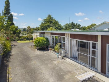 Charming Brick Unit with HUGE back yard!